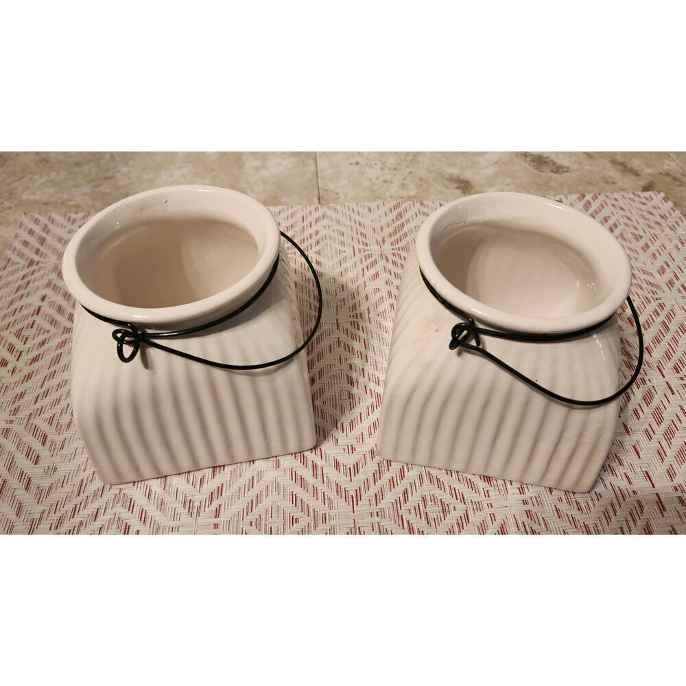Napco cream ceramic jars with metal wire hangers